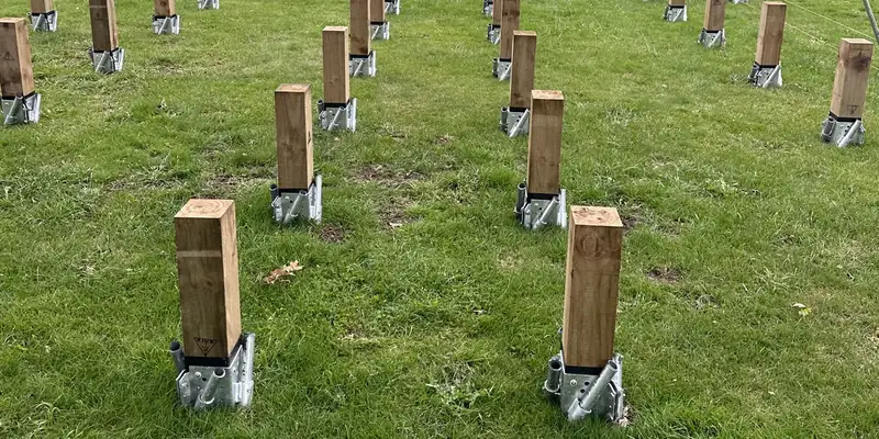 Timber pile foundations for portable home installation
